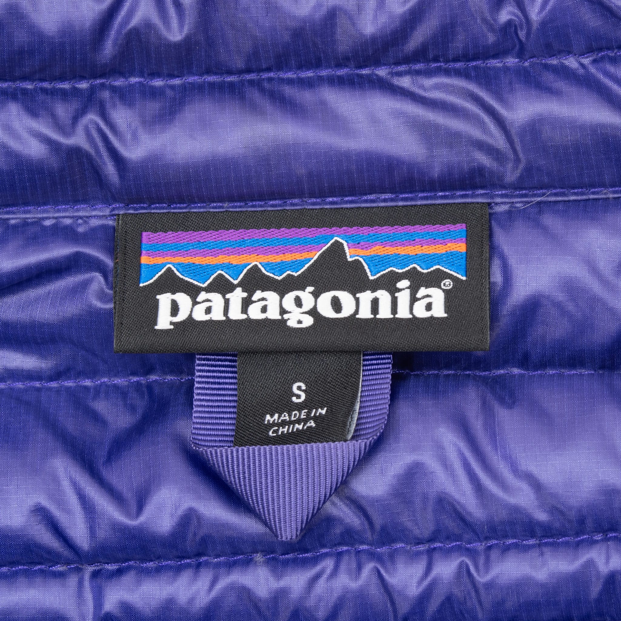 Vintage Patagonia Purple Womens Ultralight Down Vest Puffer Jacket Size Small

Style #84781