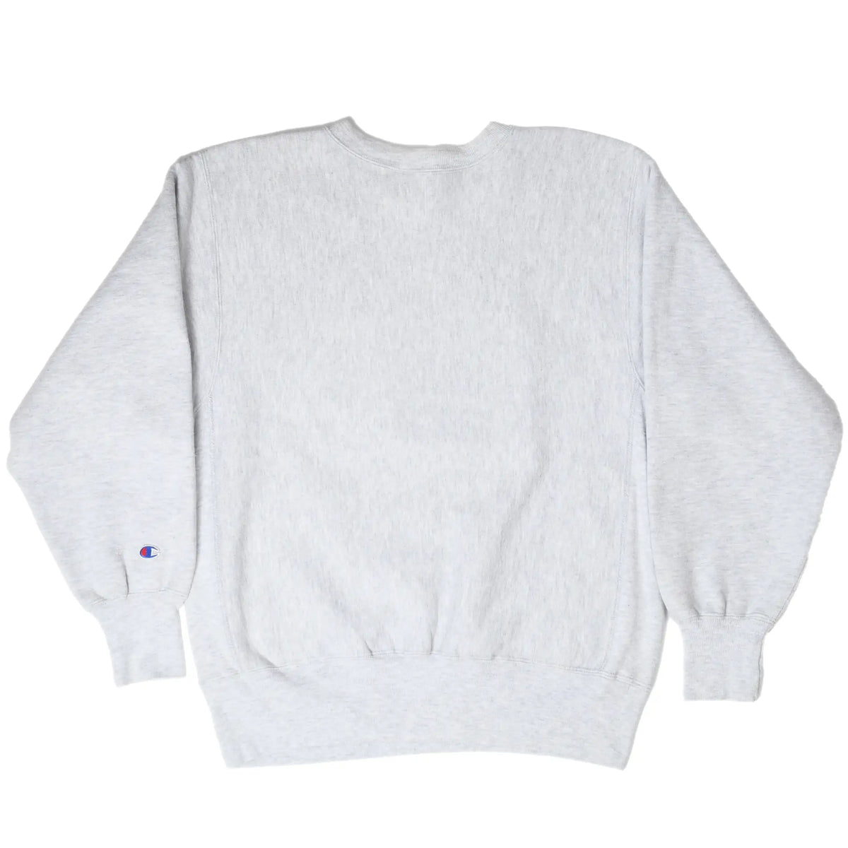 Back of gray Champion sweatshirt with small logo patch on the sleeve