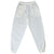 Front of white Nike track pants with side pockets, elastic cuffs, and tonal Swoosh embroidery