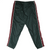 Back of dark green Nike track pants with burgundy side panels, white piping, and elastic cuffs