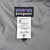 Patagonia interior brand and Common Threads labels showing men's XL and product details