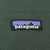 Patagonia mountain logo patch on green shell fabric