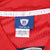 Close-up of Reebok NFL Equipment On Field collar label marked 52