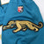 Embroidered Jacksonville Jaguars prowling jaguar sleeve logo and Wilson shield on teal mesh