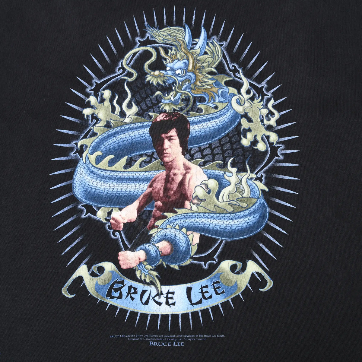 Close-up of Bruce Lee graphic surrounded by a blue dragon and flames