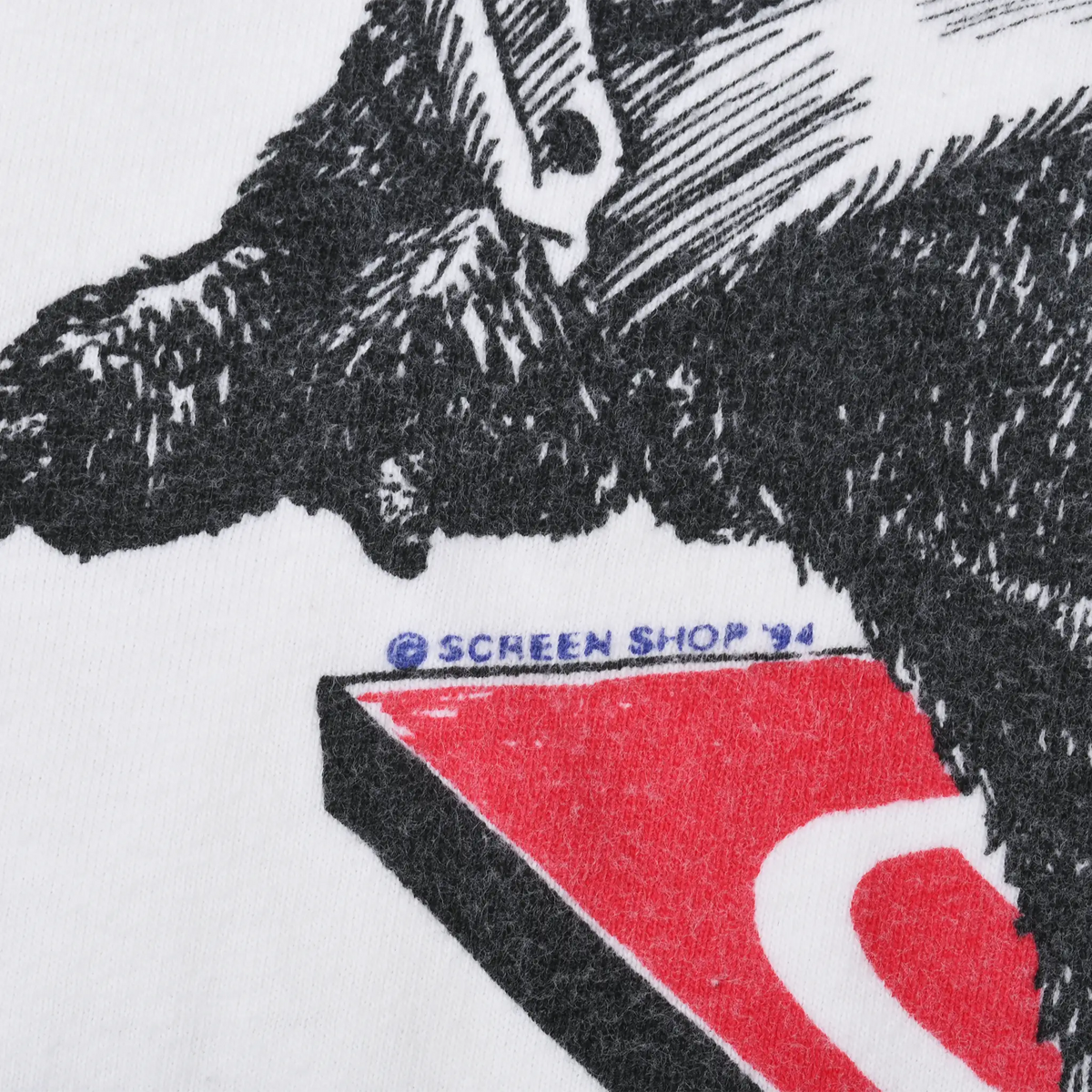 Close-up of Screen Shop 94 copyright mark within the bulldog print