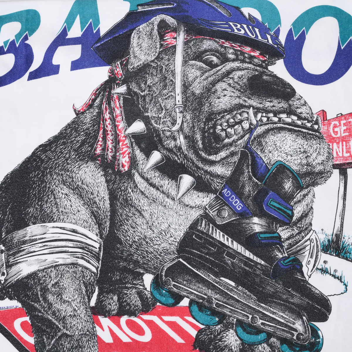 Close-up of front graphic showing helmeted bulldog holding a black roller skate