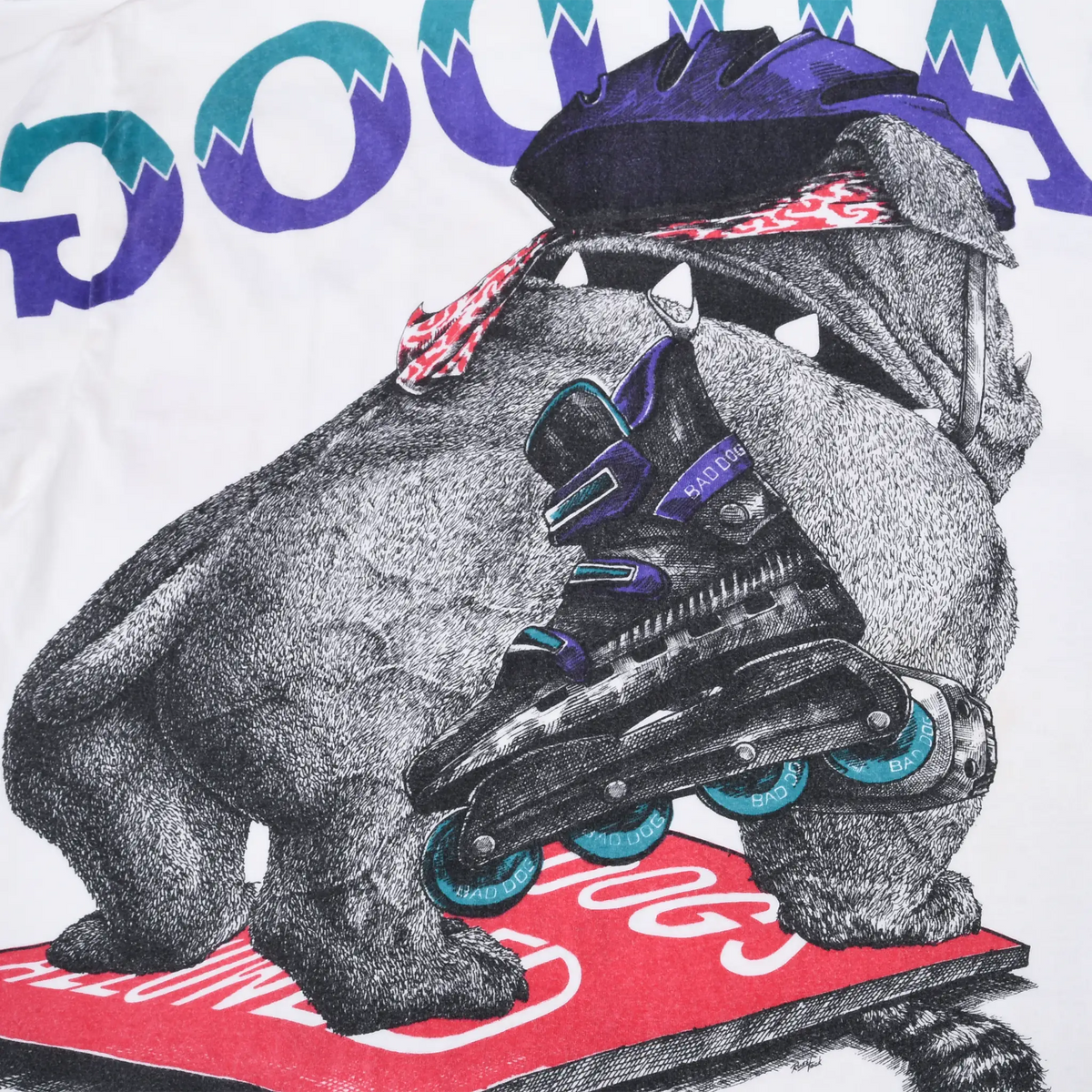 Close-up of back graphic showing bulldog carrying black roller skates