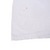 Close-up of lower back and hem with arrow marking a small spot on white fabric