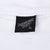 Black Diamond Dust XL neck tag on white T-shirt