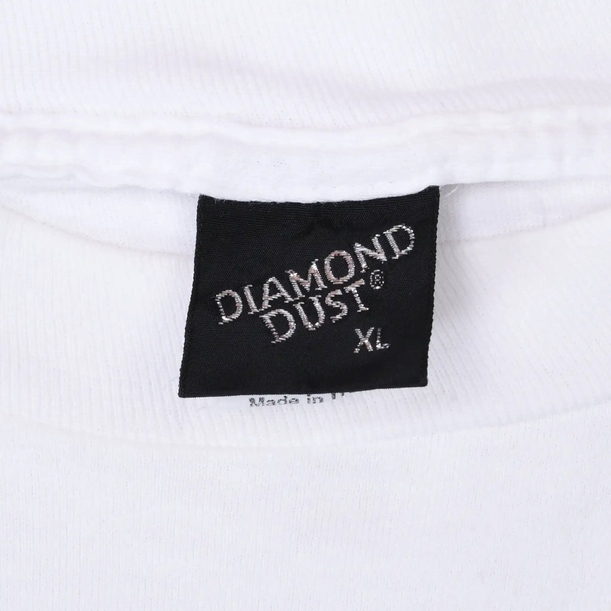 Black Diamond Dust XL neck tag on white T-shirt