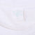 Close-up of the faded printed neck tag inside the white T-shirt collar