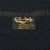 Champion's neck label marked XL, pre-shrunk 100% cotton and Made in U.S.A.