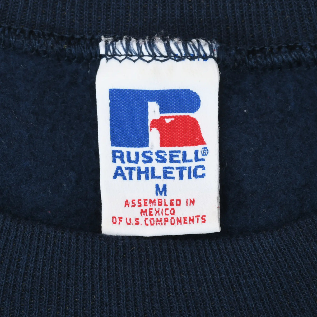 Russell Athletic neck tag marked M and assembled in Mexico of U.S. components