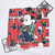 Close-up of colorful Mickey Mouse front print with red lettering and plaid accents