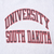 Close-up of red and black University South Dakota chest print on gray fabric