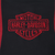 Close-up of red Harley-Davidson Motor Cycles shield embroidery on black chest