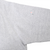 Close-up of small dark spot on grey sweatshirt sleeve, marked by an arrow