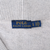 Close-up of Polo Ralph Lauren neck label and grey fleece lining