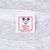 Disney Wear neck label with Mickey Mouse graphic and Made in U.S.A. text