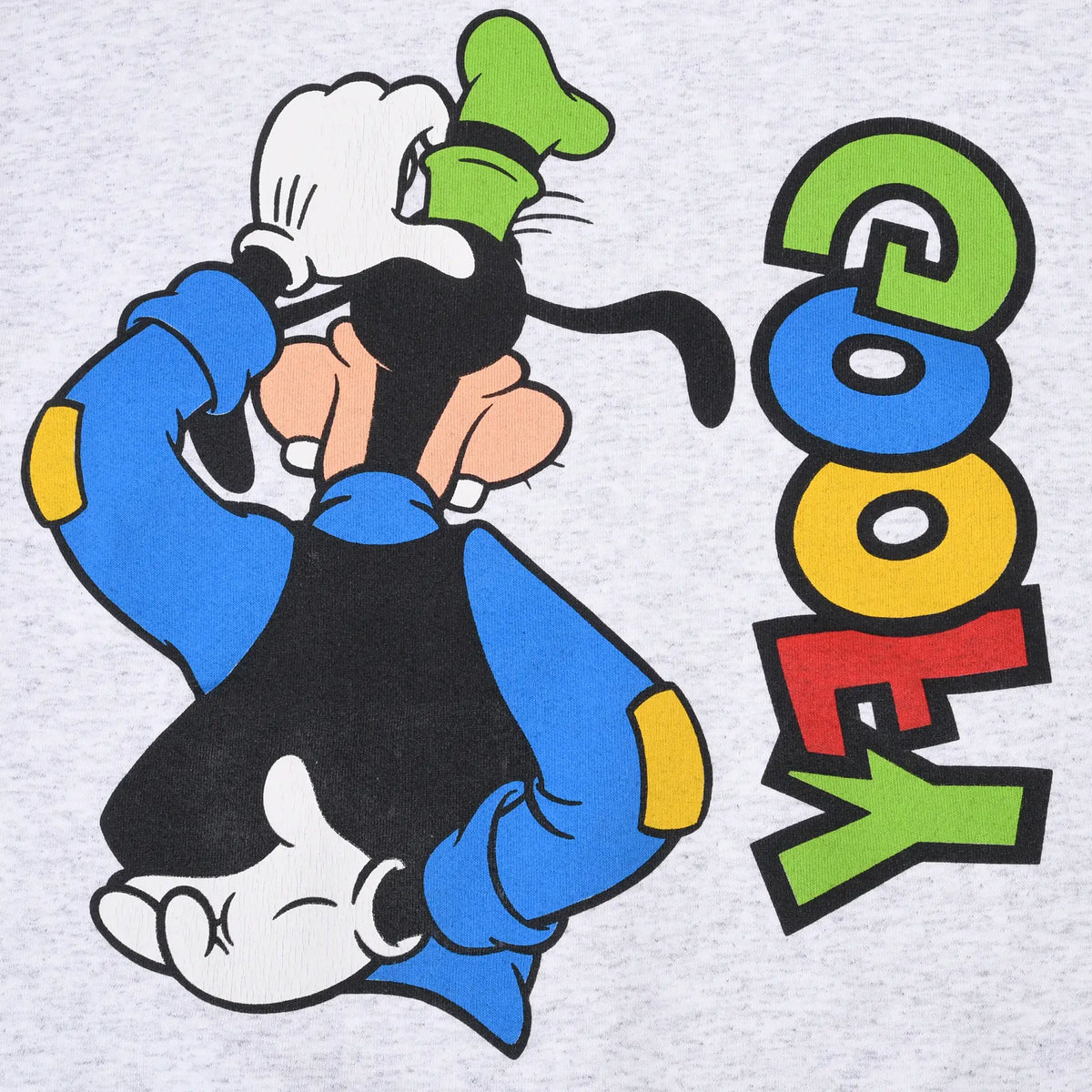 Close-up of back graphic showing seated Goofy beside colorful vertical lettering
