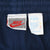 Nike size L brand and care labels inside navy blue track pants
