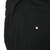 Close-up of black pant fabric with arrow marking a small spot