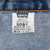 Levi's 505 interior tag marked regular fit, straight leg, W38 L32, 100% cotton, and Made in USA