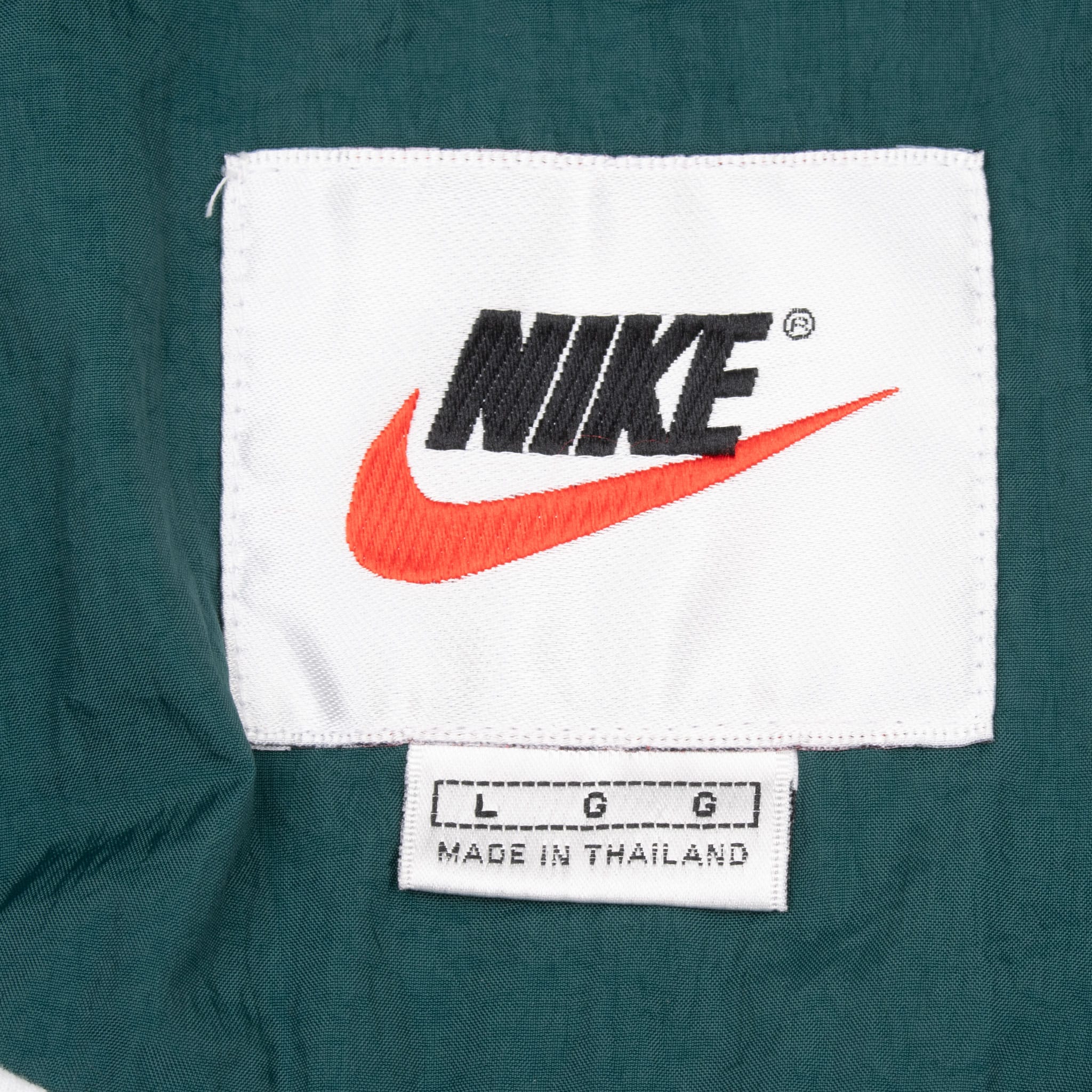 VINTAGE NIKE BLACK AND GREEN SWOOSH WINDBREAKER JACKET 1990S LARGE