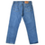Back view of Levi's 501 indigo blue jeans with two stitched pockets and tan waistband patch