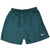 Front of green Nike swim trunks with elastic waist and small white Swoosh embroidery