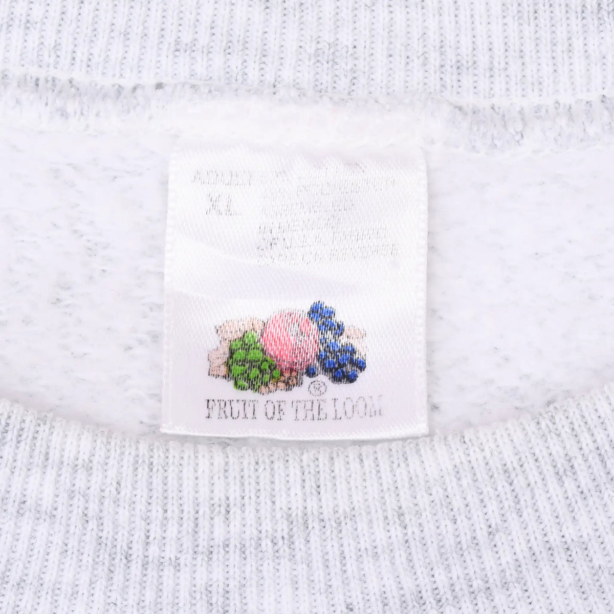 Close-up of Fruit of the Loom XL neck label inside grey sweatshirt