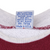 Close-up of sweatshirt care label listing cotton blend, washing instructions, and Made in USA