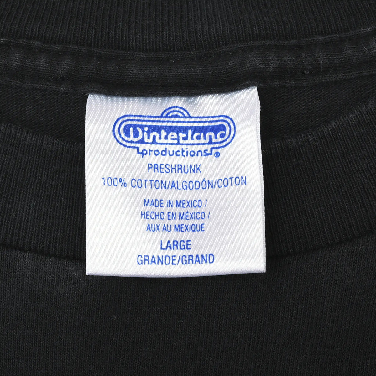 Winterland Productions neck tag marked preshrunk, 100% cotton, made in Mexico, and large