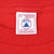 Delta XL neck tag stating 100% cotton preshrunk, fabric made in USA and assembled in Honduras