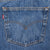 Levi's jeans back pocket with orange arcuate stitching and red tab