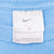 VINTAGE NIKE ATHLETICS SPELLOUT BLUE LONG SLEEVE TEE SHIRT 2000S 2XL MADE IN USA