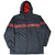 Full front view of black Nike hooded windbreaker with red stripe, white piping, and zip pockets