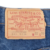 Beautiful Indigo Levis 505 Jeans Made in USA with a medium blue wash.  Size on Tag 32X30  Back Button #552