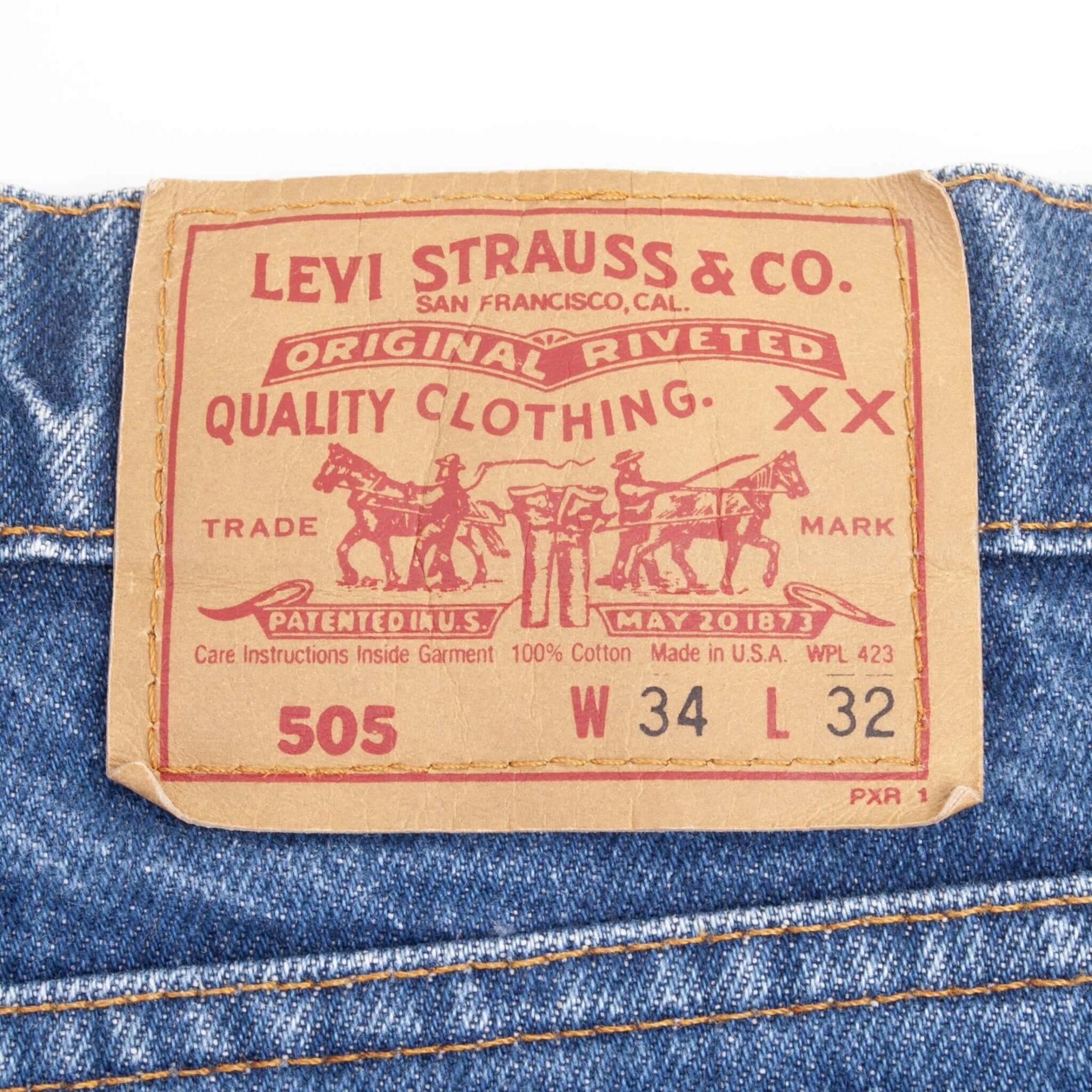 Beautiful Indigo Levis 505 Jeans Made in USA with a medium blue wash.  Size on Tag 34X32 Back Button #527