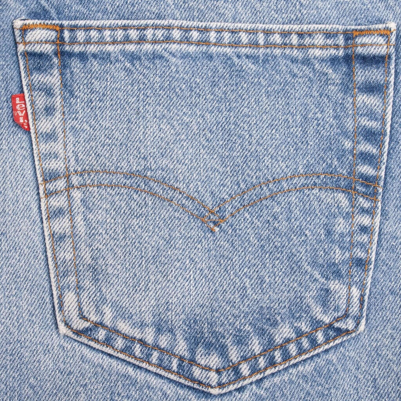 Beautiful Indigo Levis 505 Jeans Made in USA with a light blue wash. Size on Tag 32X33 Actual Size 32X31  Back Button #552