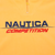 Close-up of navy and red Nautica Competition chest embroidery below quarter zip