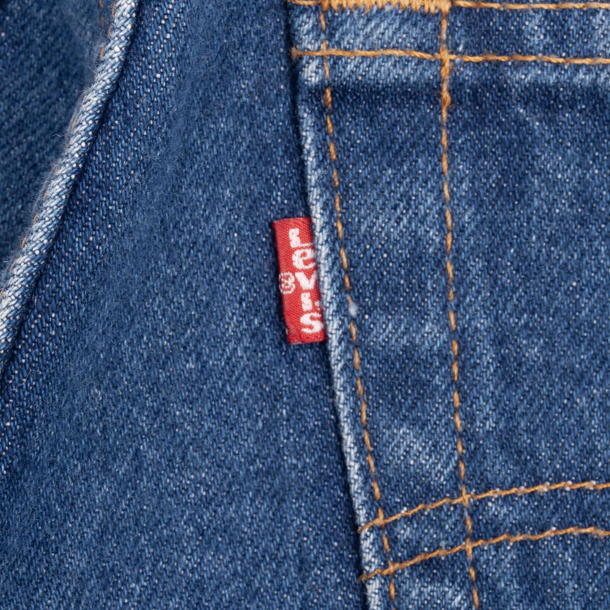 Beautiful Indigo Levis 505 Jeans Made in USA with a medium blue wash.  Size on Tag 32X34 Actual Size 32X33 Back Button #552