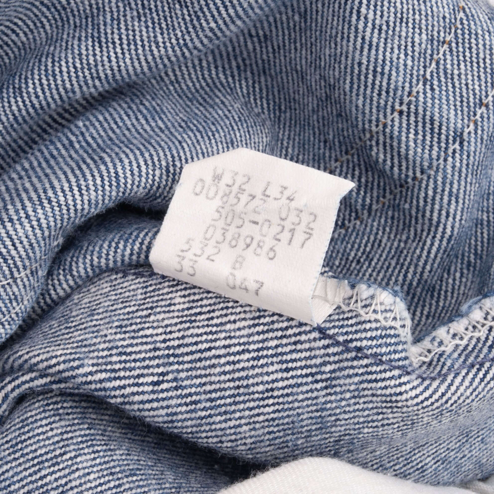 Beautiful Indigo Levis 505 Jeans Made in USA with a medium blue wash.  Size on Tag 32X34 Actual Size 32X33 Back Button #552