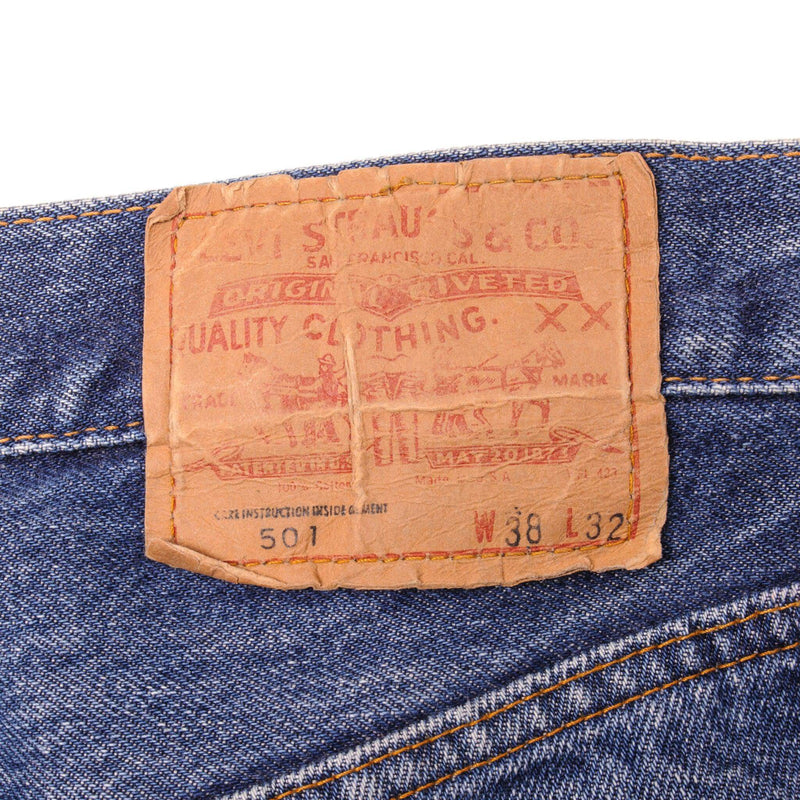 Beautiful Indigo Levis 501 Jeans before mid 1980's with Selvedge Made in USA with a medium blue wash, a nice contrast of light and medium blue and some beautiful strong Whiskers.  Size on Tag 38X32  ACTUAL SIZE 35X28  Back Button #9