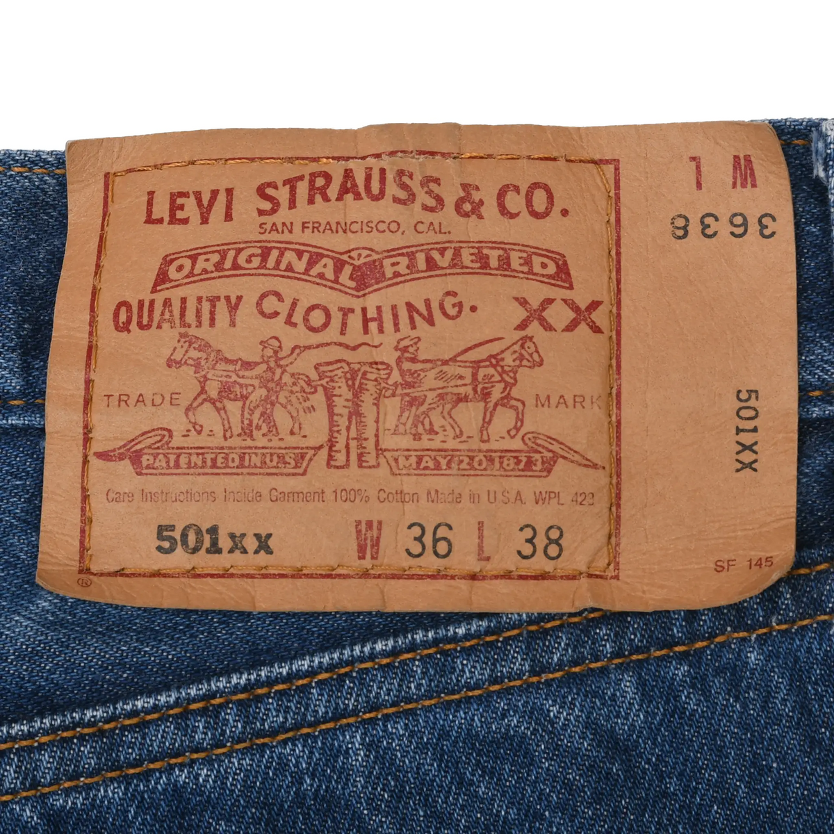 Close-up of Levi Strauss & Co. 501XX waist patch marked W36 L38