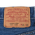 Levi Strauss 501 waistband patch marked W31 L33 on blue denim