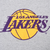 Close-up of purple and gold Los Angeles Lakers basketball logo printed on gray fabric