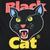 Close-up of Black Cat back graphic with green eyes and red and yellow lettering