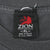 Close-up of black Zion Rootswear XL neck tag with red lion logo
